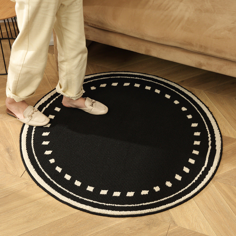 Meragh Black Modern Round Area Rug with Geometric Black and White Pattern